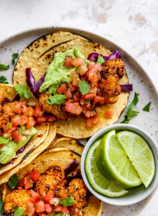 Roasted Cauliflower Black Bean Tacos with Spinach and Avocado Crema